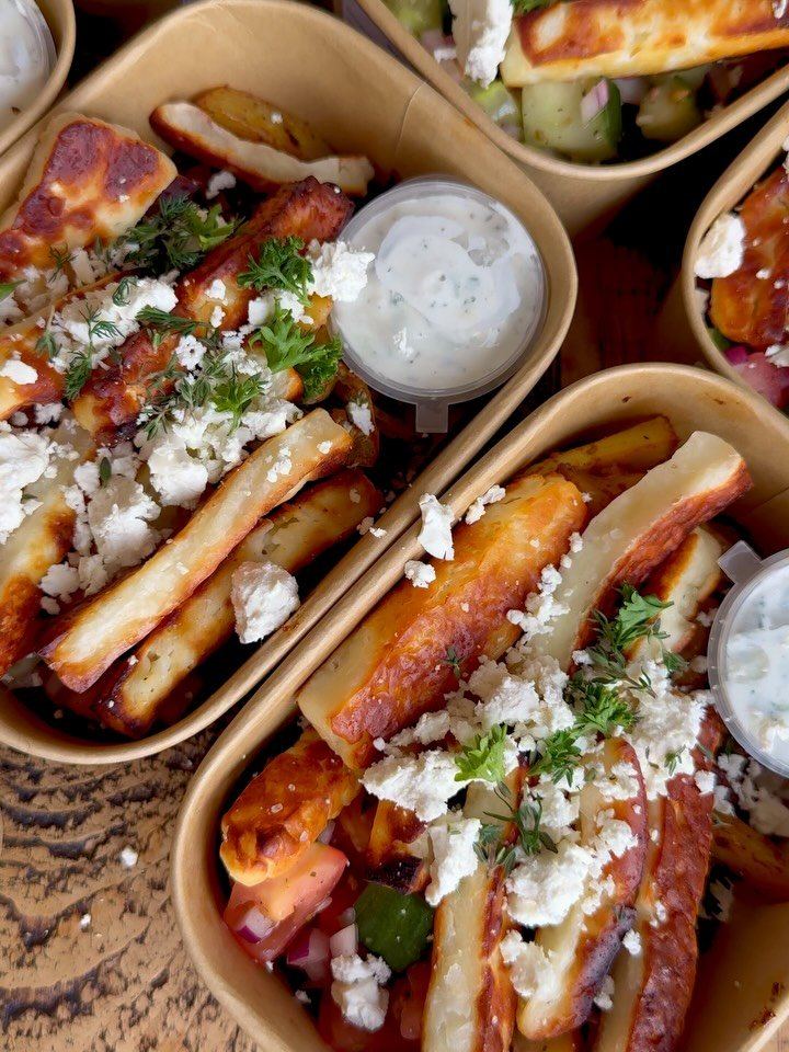 Greek bowls with tzatziki pots